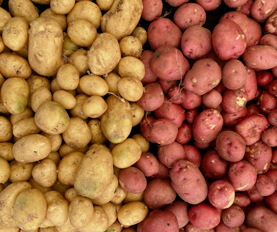 Yellow potatoes next to Red potatoes