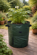 Green potato grow bag in garden